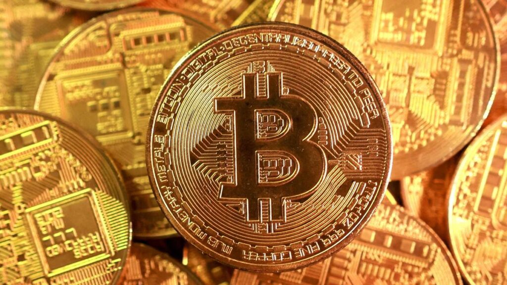 Bitcoin falls 9%; Asian shares slip as Wall Street hit by tech losses