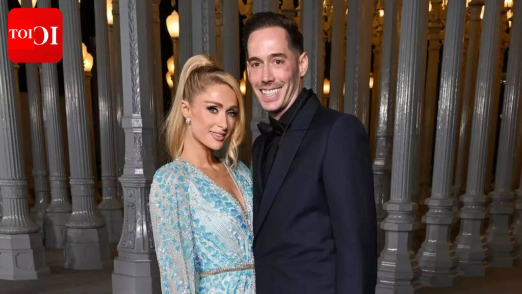 Paris Hilton’s husband, Carter Reum, says ‘she loves me to death,’ squashing the ongoing rumors about their marriage |